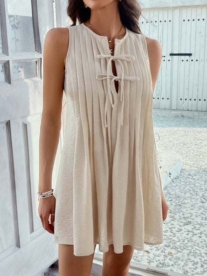 Casual holiday style solid color lace up pleated sleeveless dress