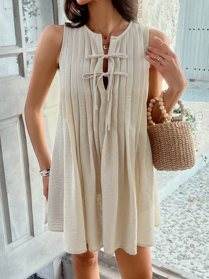 Casual holiday style solid color lace up pleated sleeveless dress